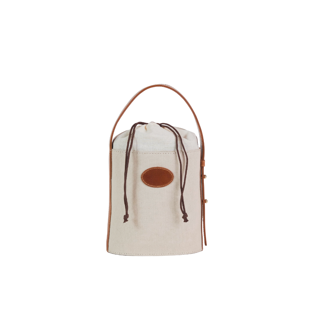 Canvas drawstring bucket bag with genuine leather trim