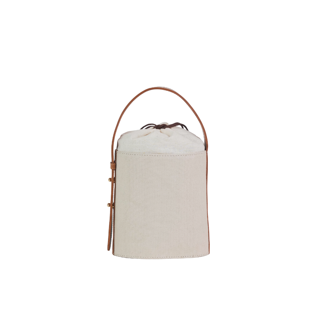 Premium canvas bucket bag featuring leather accents